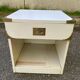 White Scandinavian bedside table in boat style made of wood.