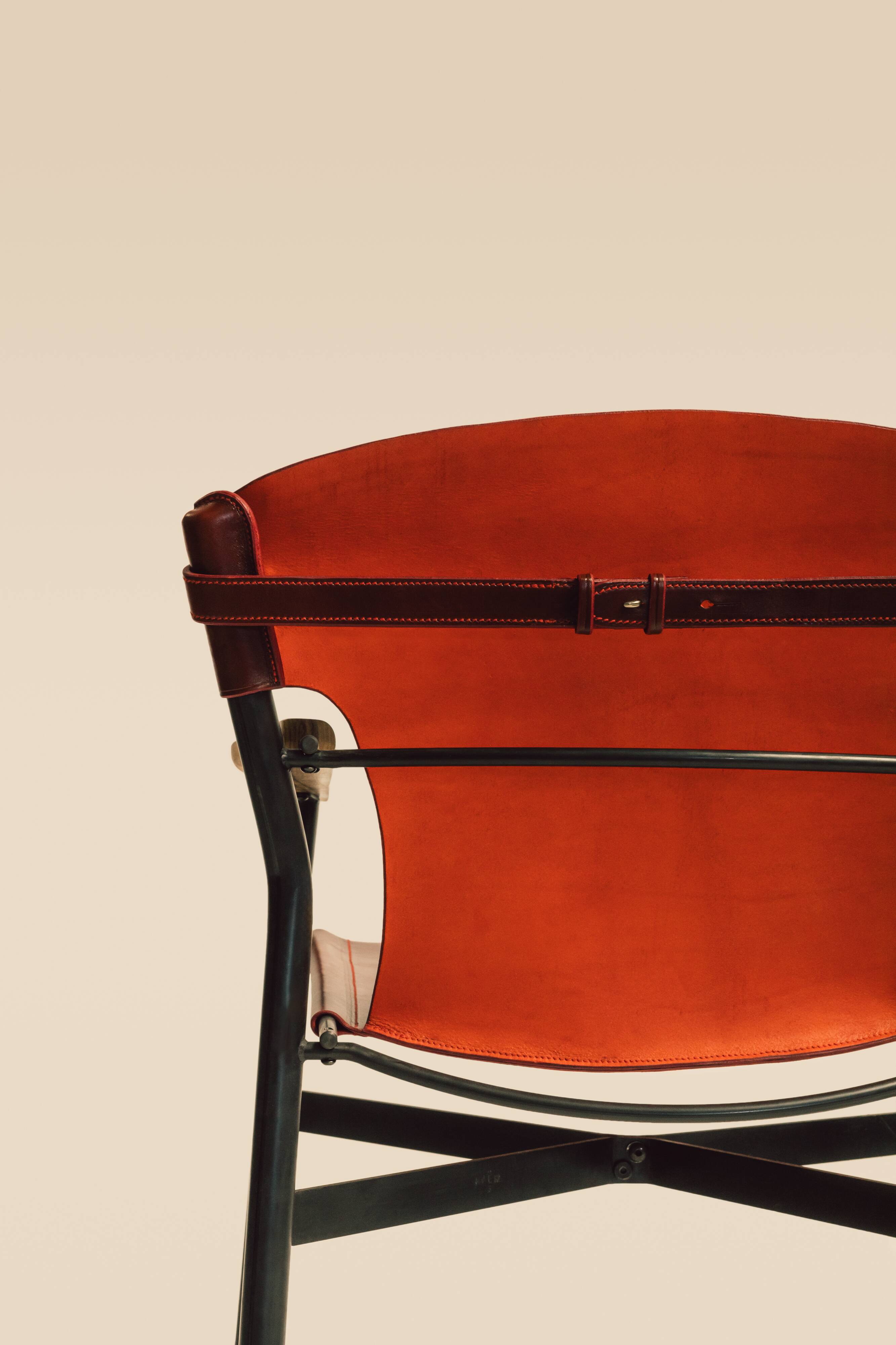 Maërl armchair, Galathée model, red leather, solid wood armrests of your choice