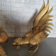 Duo of gold metal roosters 1950