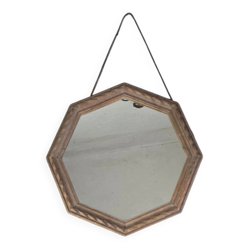 Octagonal mirror in carved wood