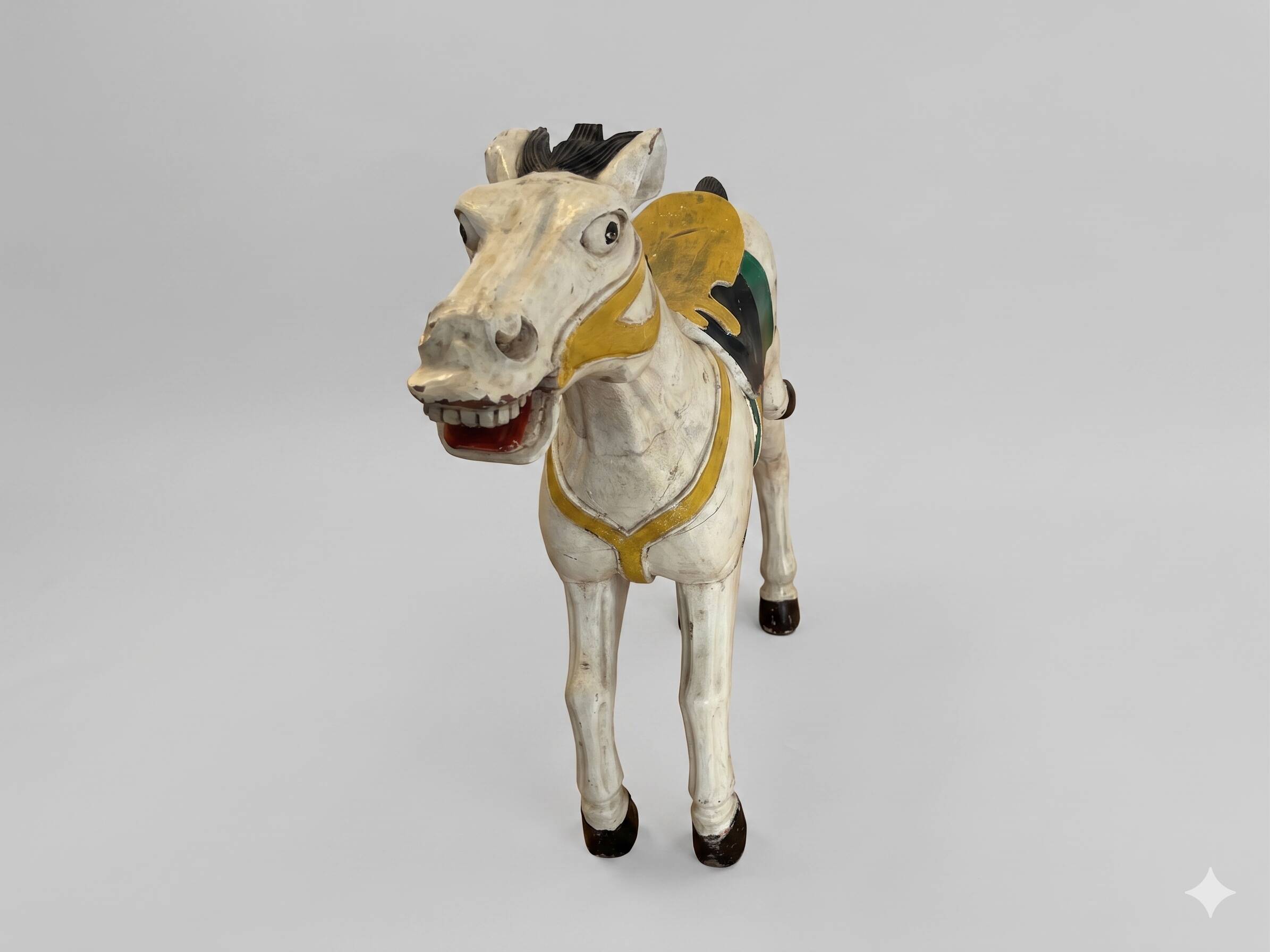 Pair of large hand-painted Indonesian horses with saddle
