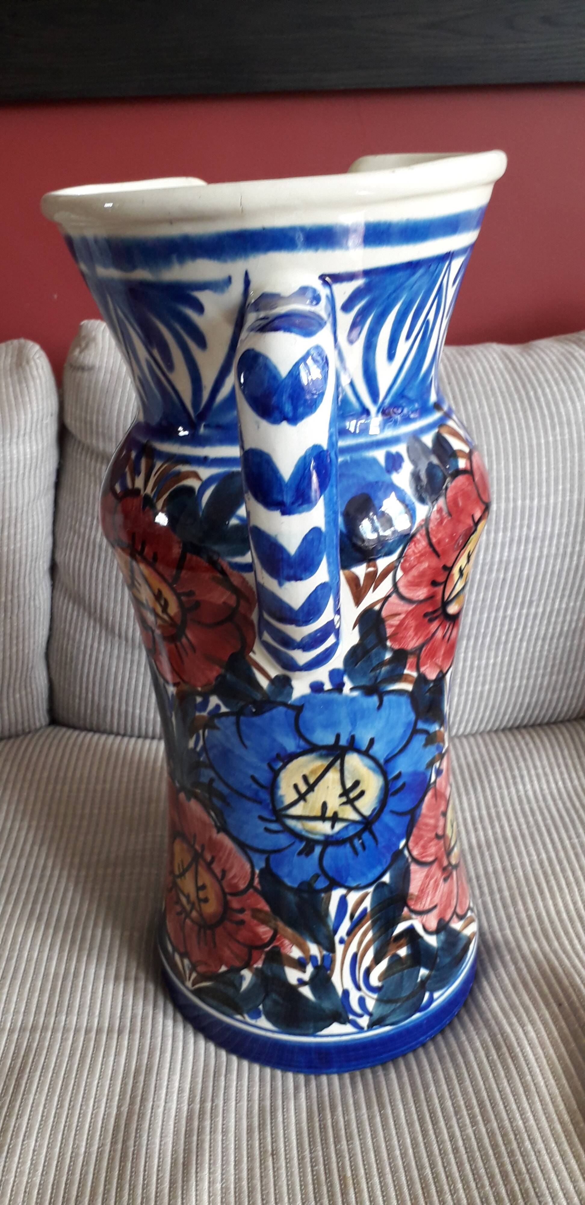 Large vintage vase with floral decoration