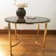 Brass round coffee table and smoked glass