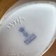 Vintage white porcelain vase AK Kaiser. It is signed Manfred Frey, 1960