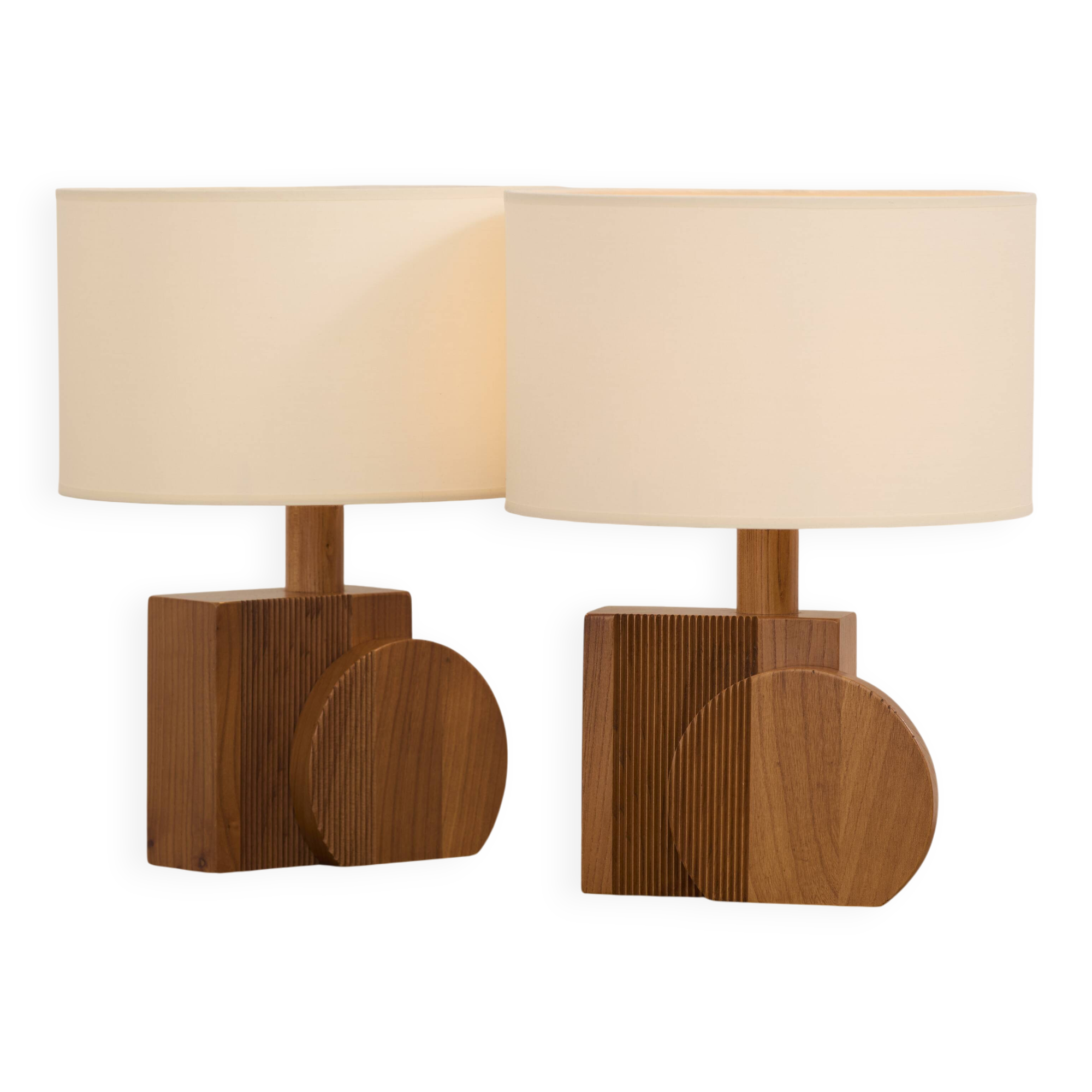 Pair of geometric handcrafted lamps in solid oak circa 1970.