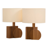 Pair of geometric handcrafted lamps in solid oak circa 1970.