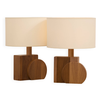 Pair of geometric handcrafted lamps in solid oak circa 1970.