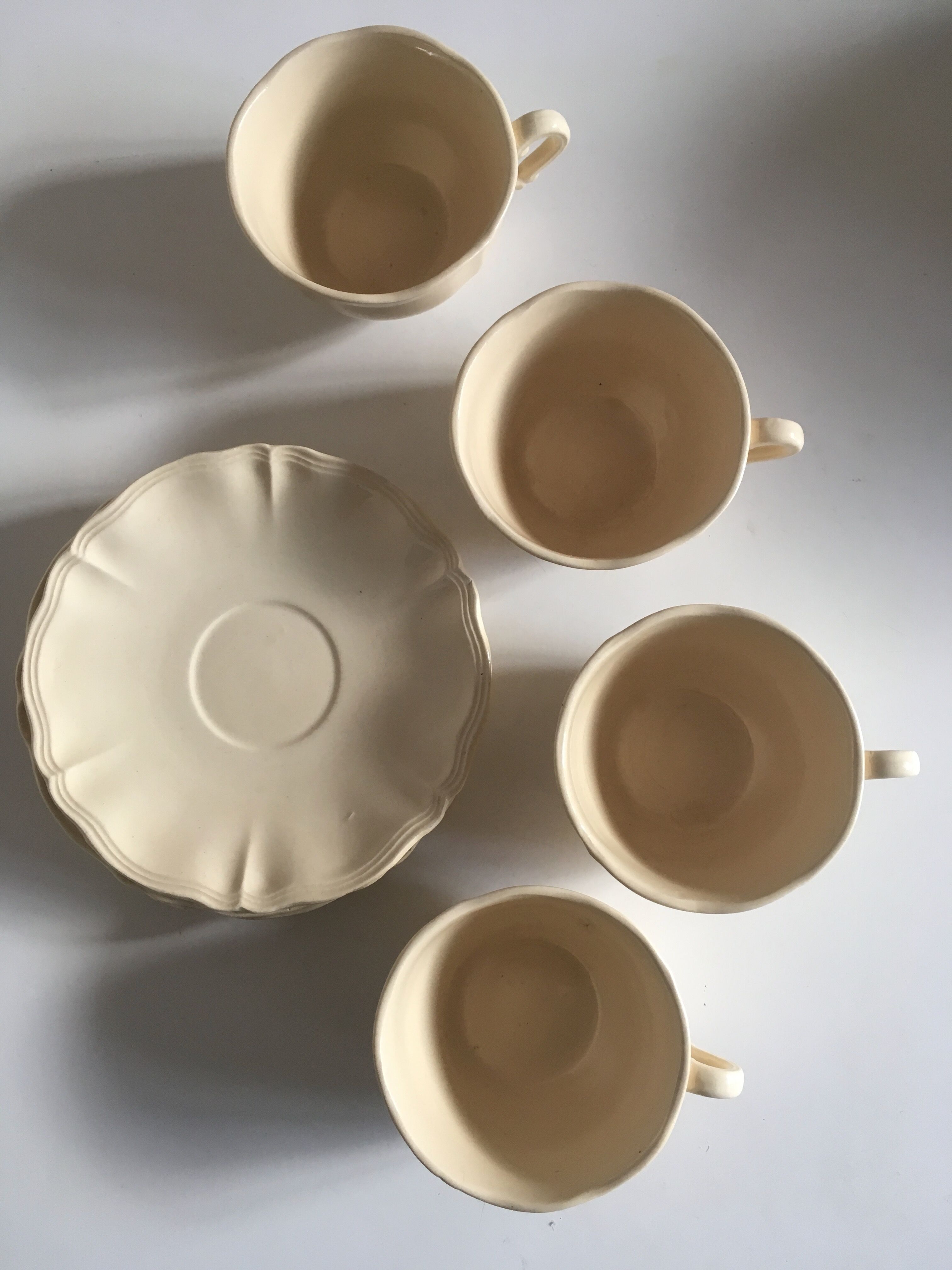 4 cups set in ivory faience from Sarreguemines to godrons