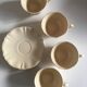 4 cups set in ivory faience from Sarreguemines to godrons