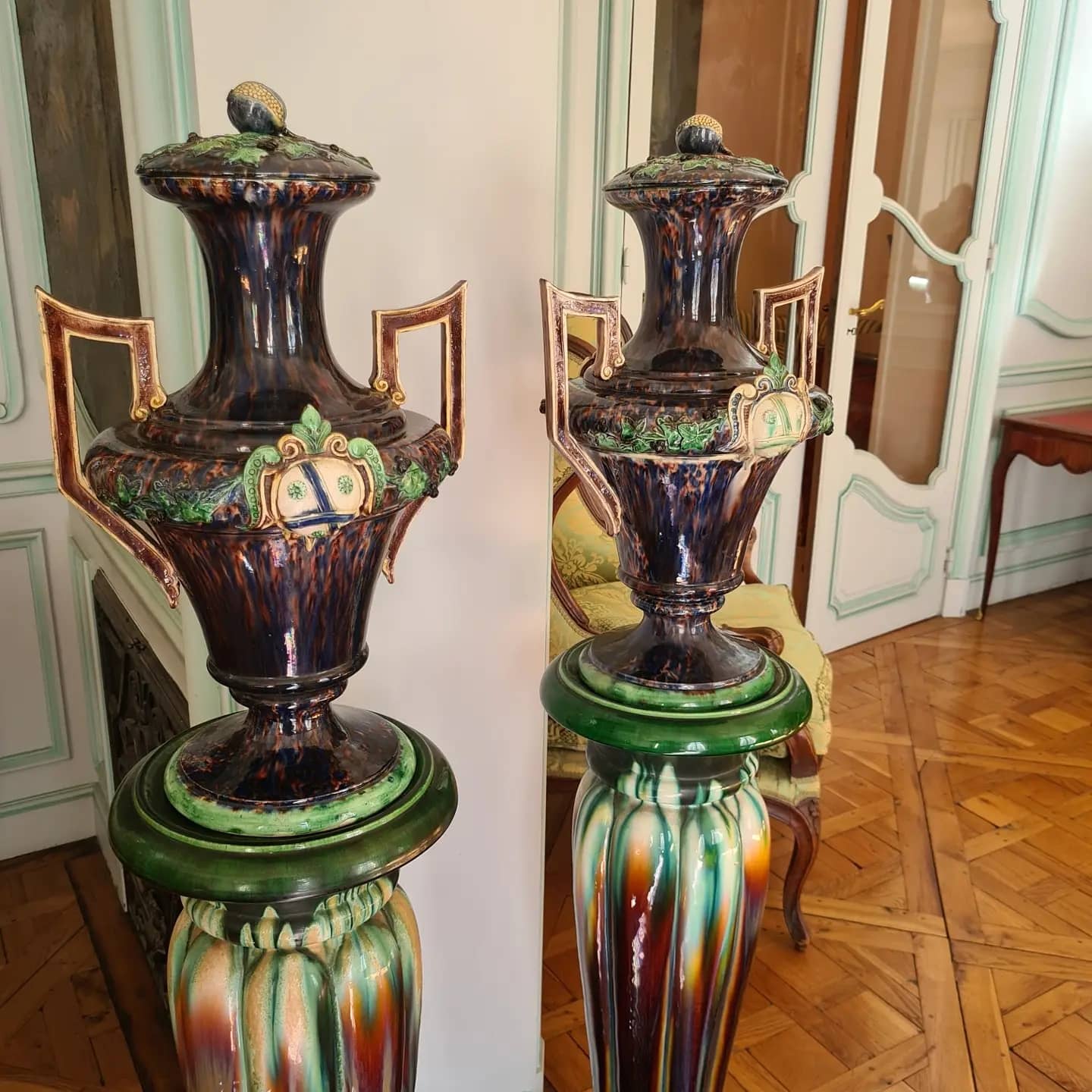Large pair of polychrome earthenware vases, circa 1860.