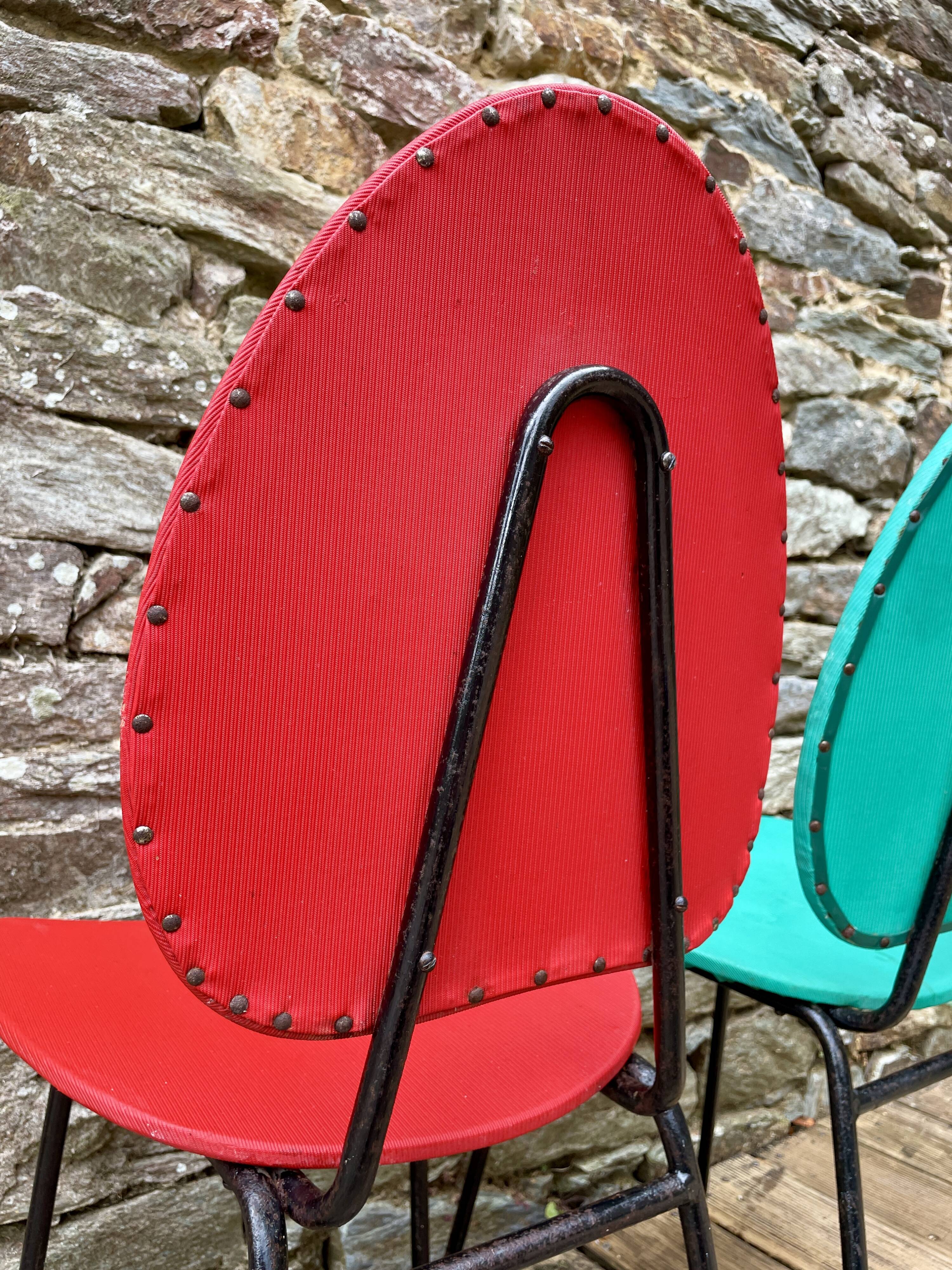 Pair of faux leather chairs from the 1950s/60s.