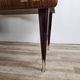 Mid-century drawer chest in mahogany, brass and glass.