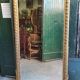 GRAND MIROIR BISEAUTE DORE AVEC TETE REF JE