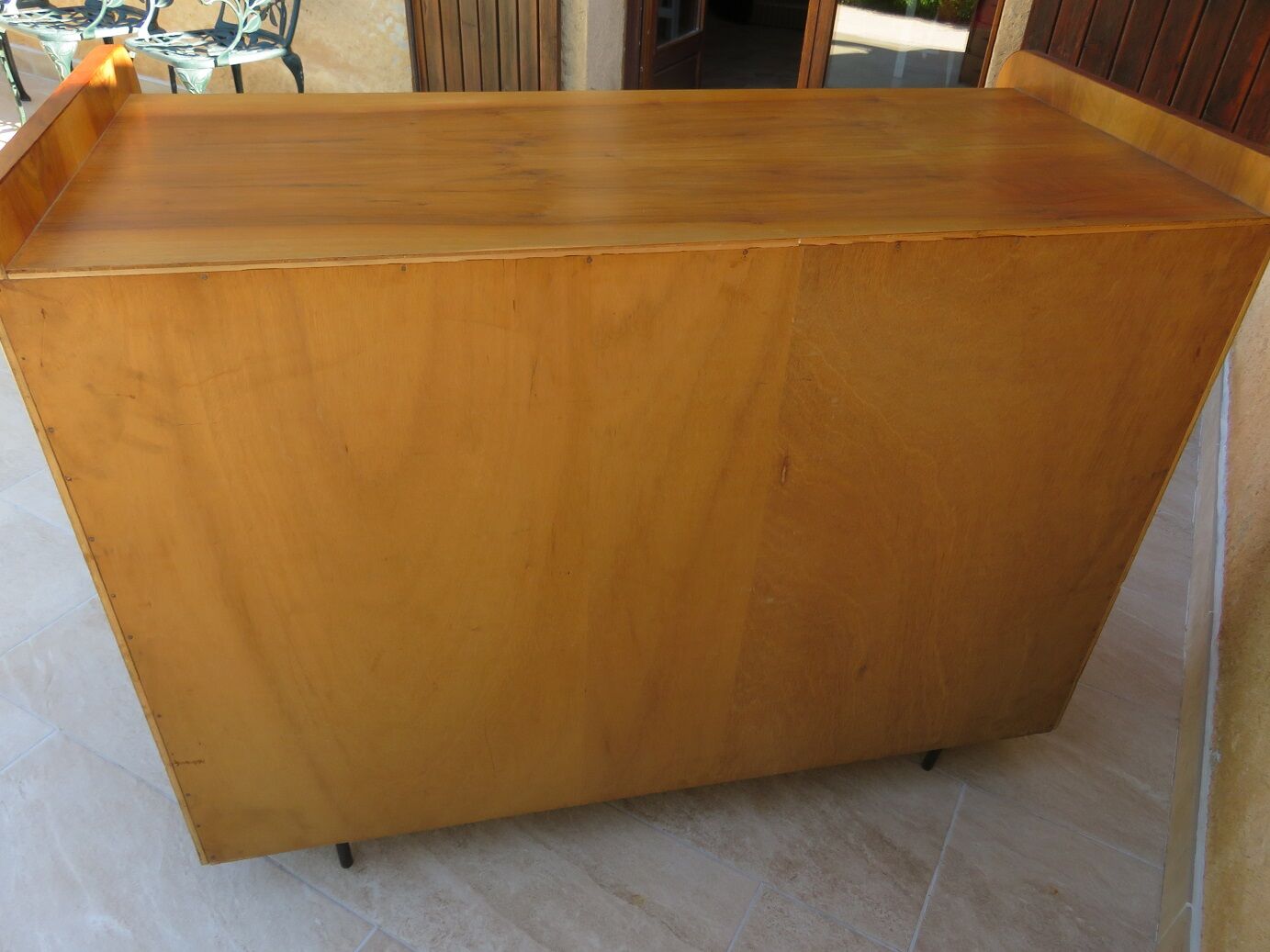 Teak chest of drawers and metal compass feet
