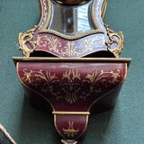 Boudoir clock on Louis XIV style console.