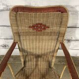 Rattan armchair and scoubidou decor