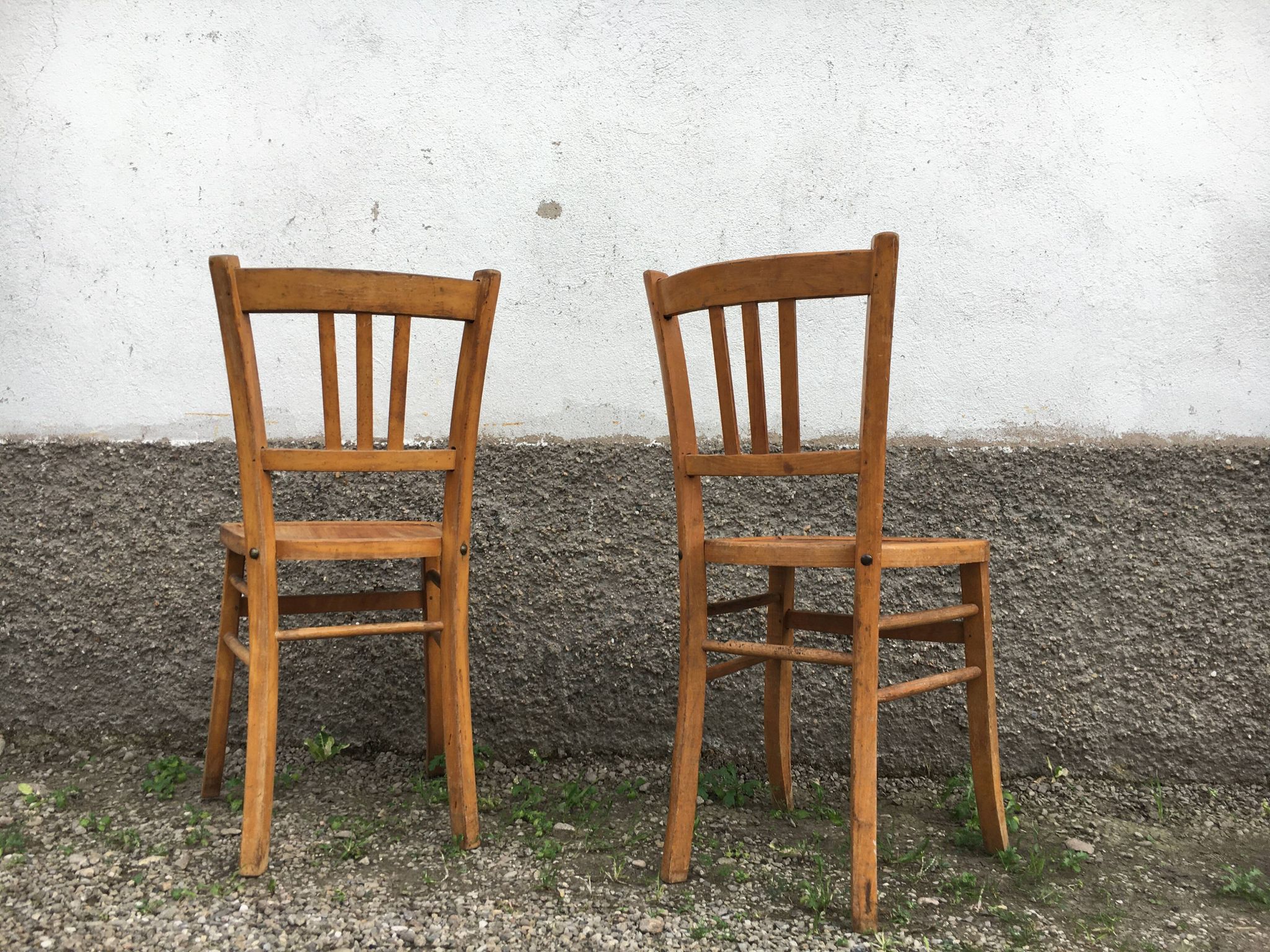 Pair of vintage curved wooden bistro chairs