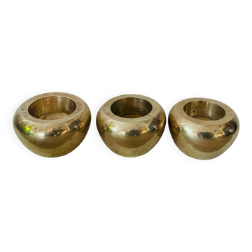 Three brass candlesticks