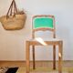 Renovated antique chair – carved wood and green backrest