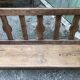 Duo of old solid oak benches with backs and armrests.