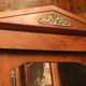 Mahogany pediment and half-column mirror and 118x91cm Empire-style bronze ornament
