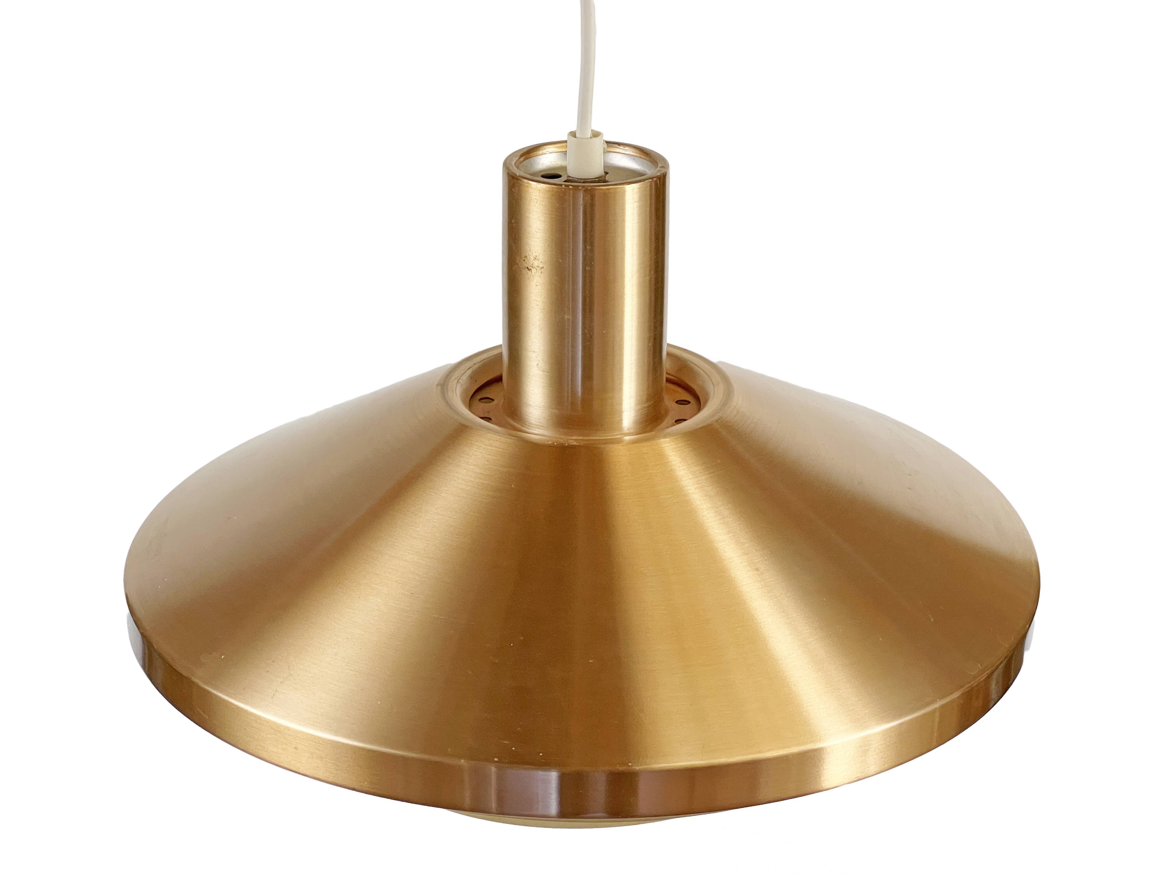 Copper colored aluminum pendant light from Lyskaer belysning. Denmark 1970s