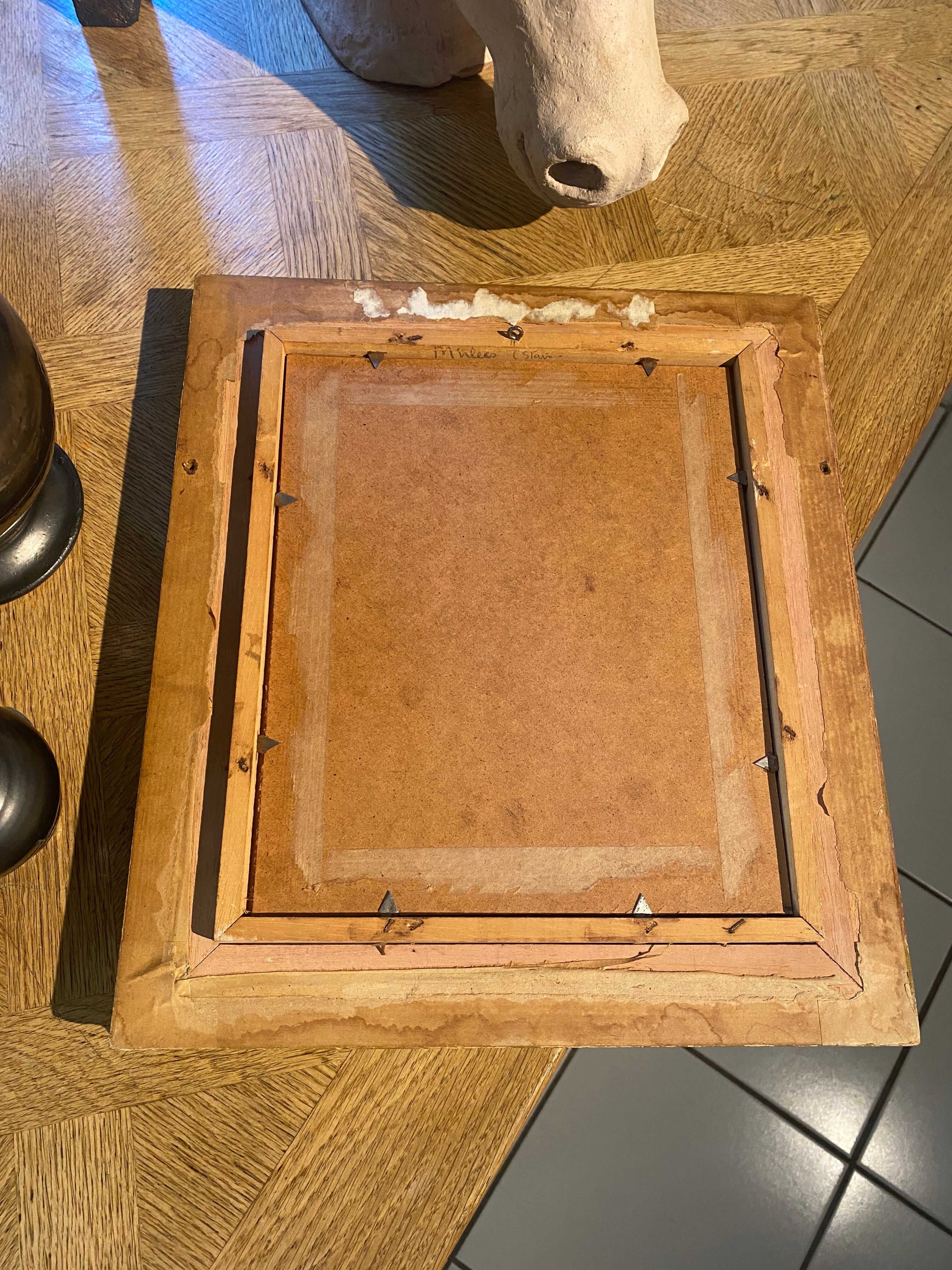 Old portrait in gilded wood