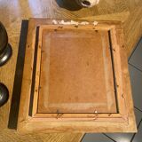 Old portrait in gilded wood