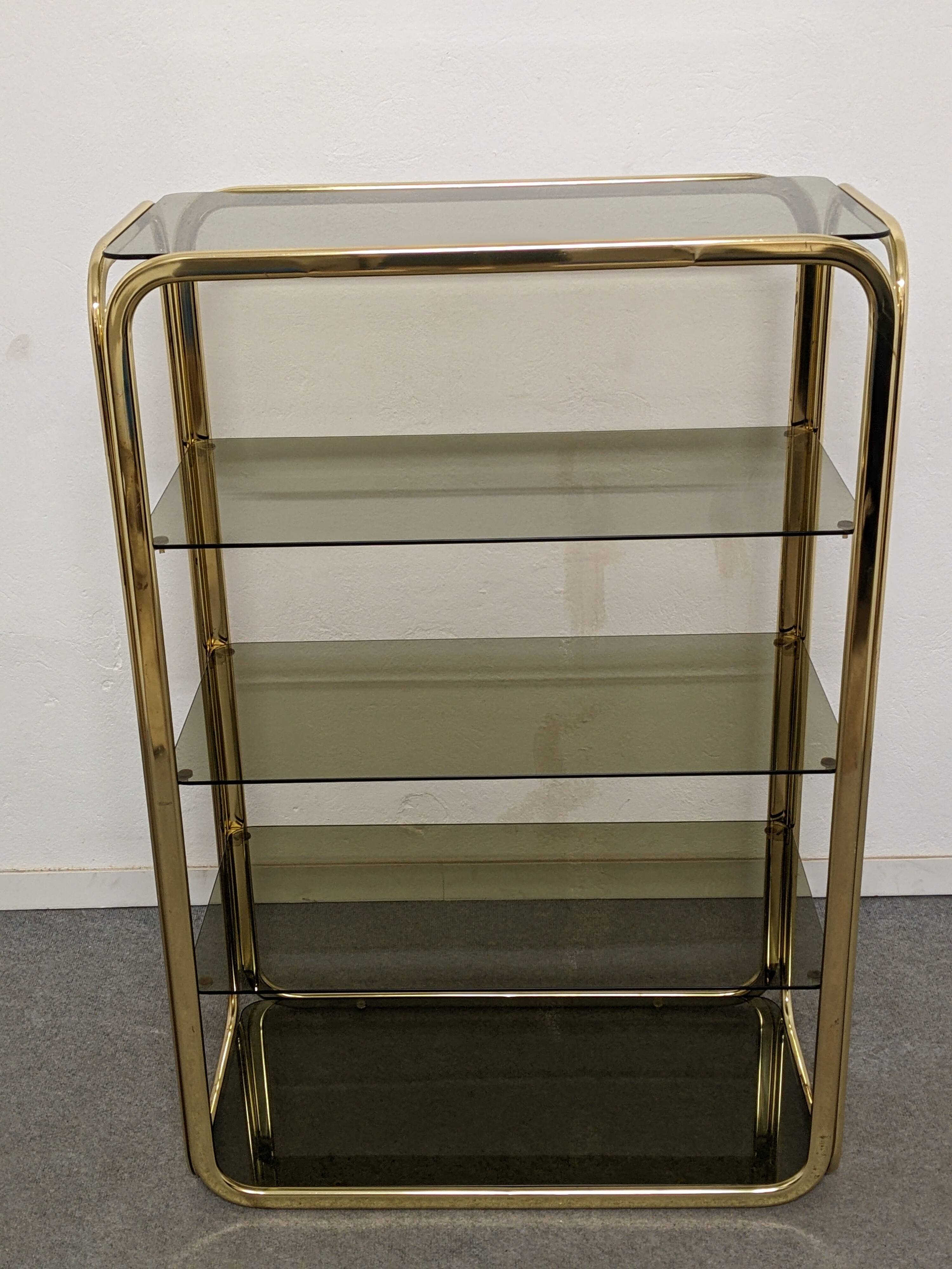 Hollywood Regency gilt metal and smoked glass shelf, Italy circa 1970
