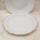 Lot 2 plats porcelaine blanc et or