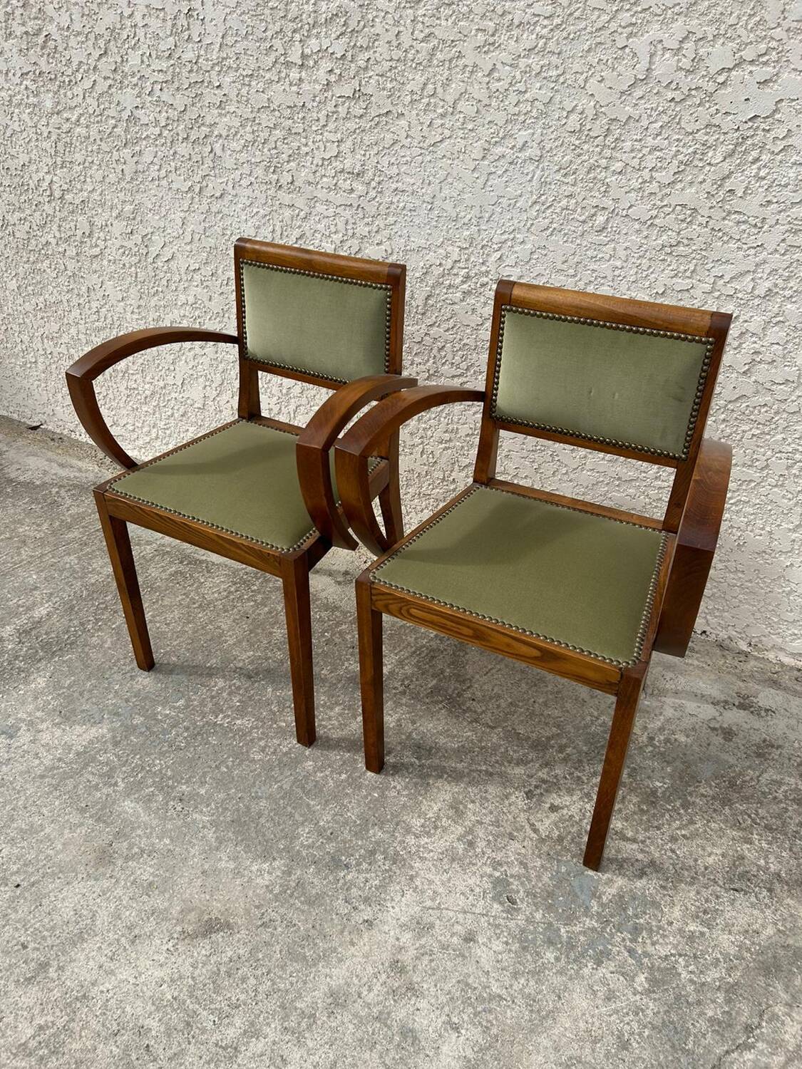 Pair of green velvet bridge armchairs