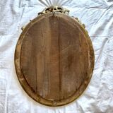 Antique oval mirror from the 20th century
