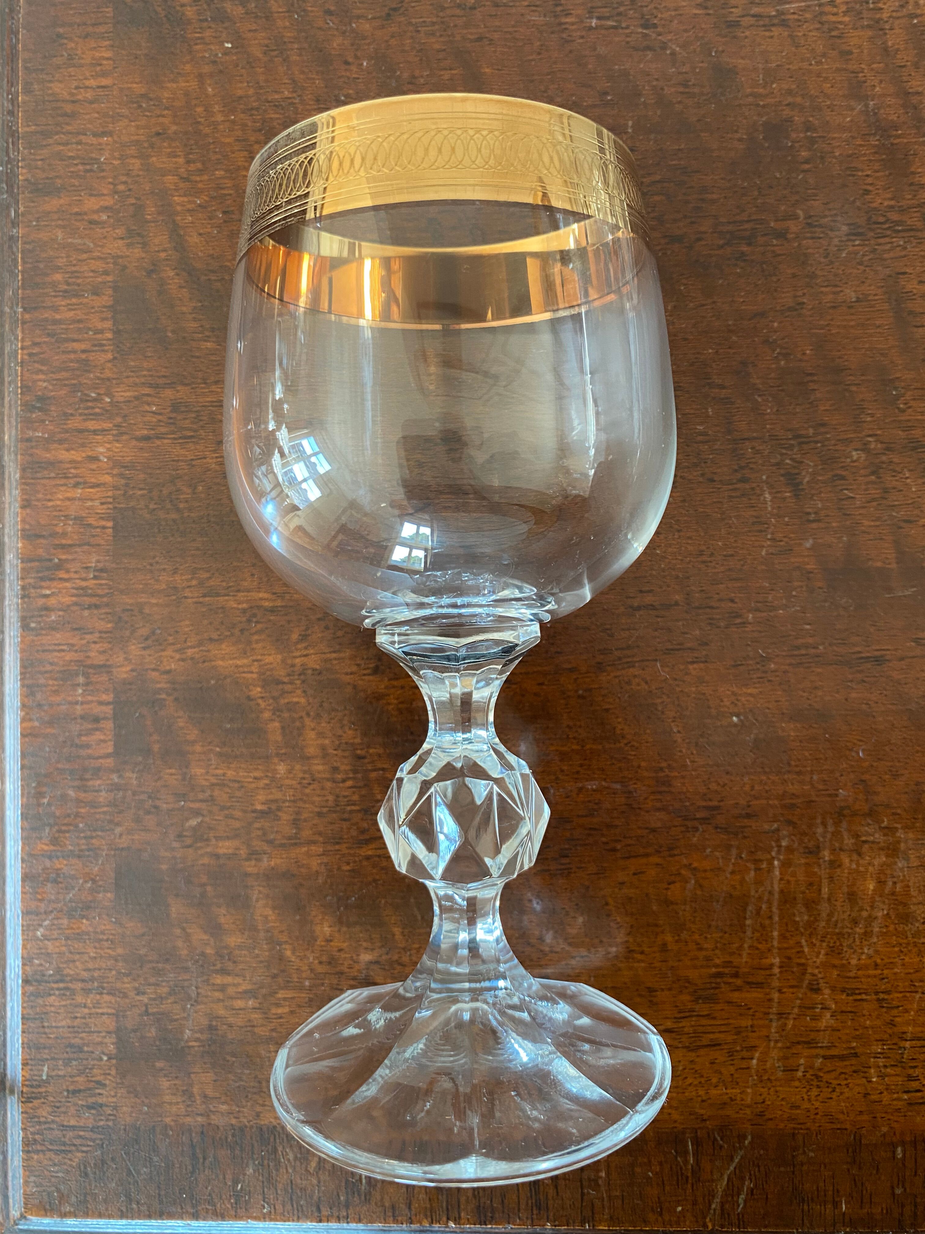 Crystal glasses with gilded edging