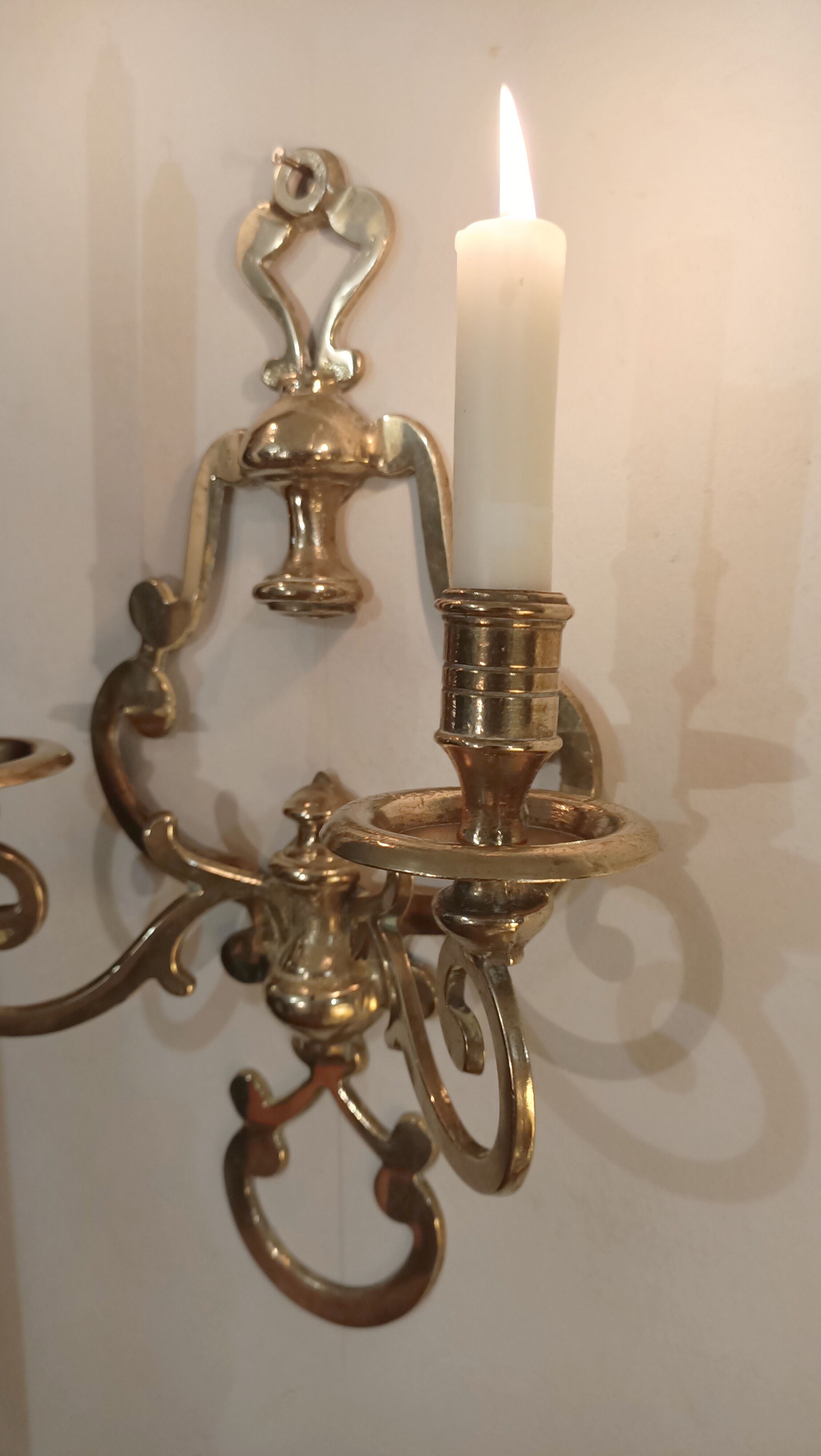 Pair of golden wall candle holders