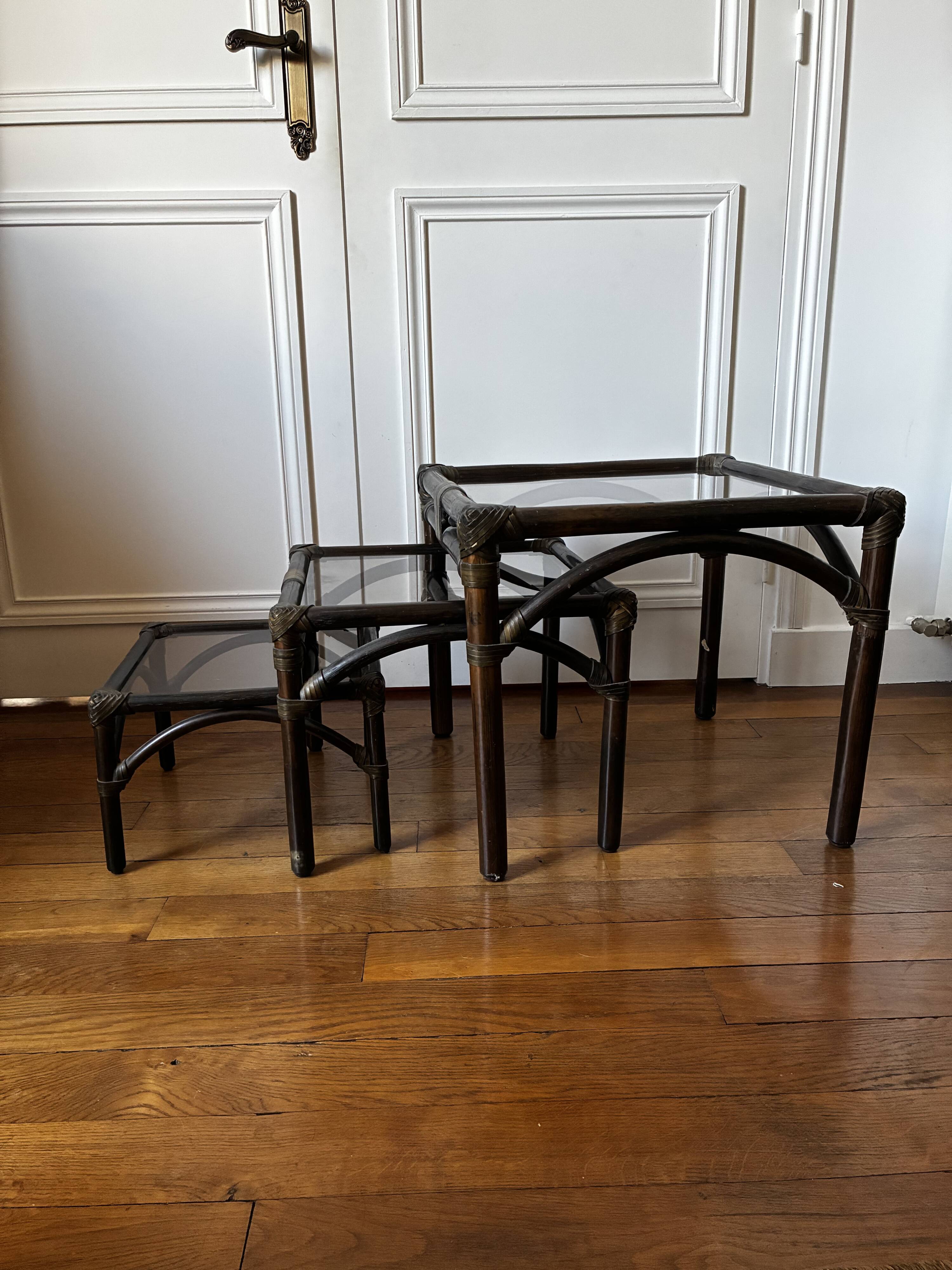 Bamboo and smoked glass nesting coffee tables