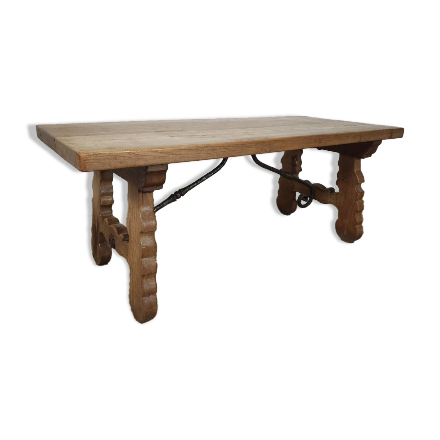 Rustic solid oak table with wrought iron, circa 1950.