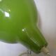 Green desk lamp with an arm from the 1970s.