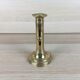 Brass pusher candle holder