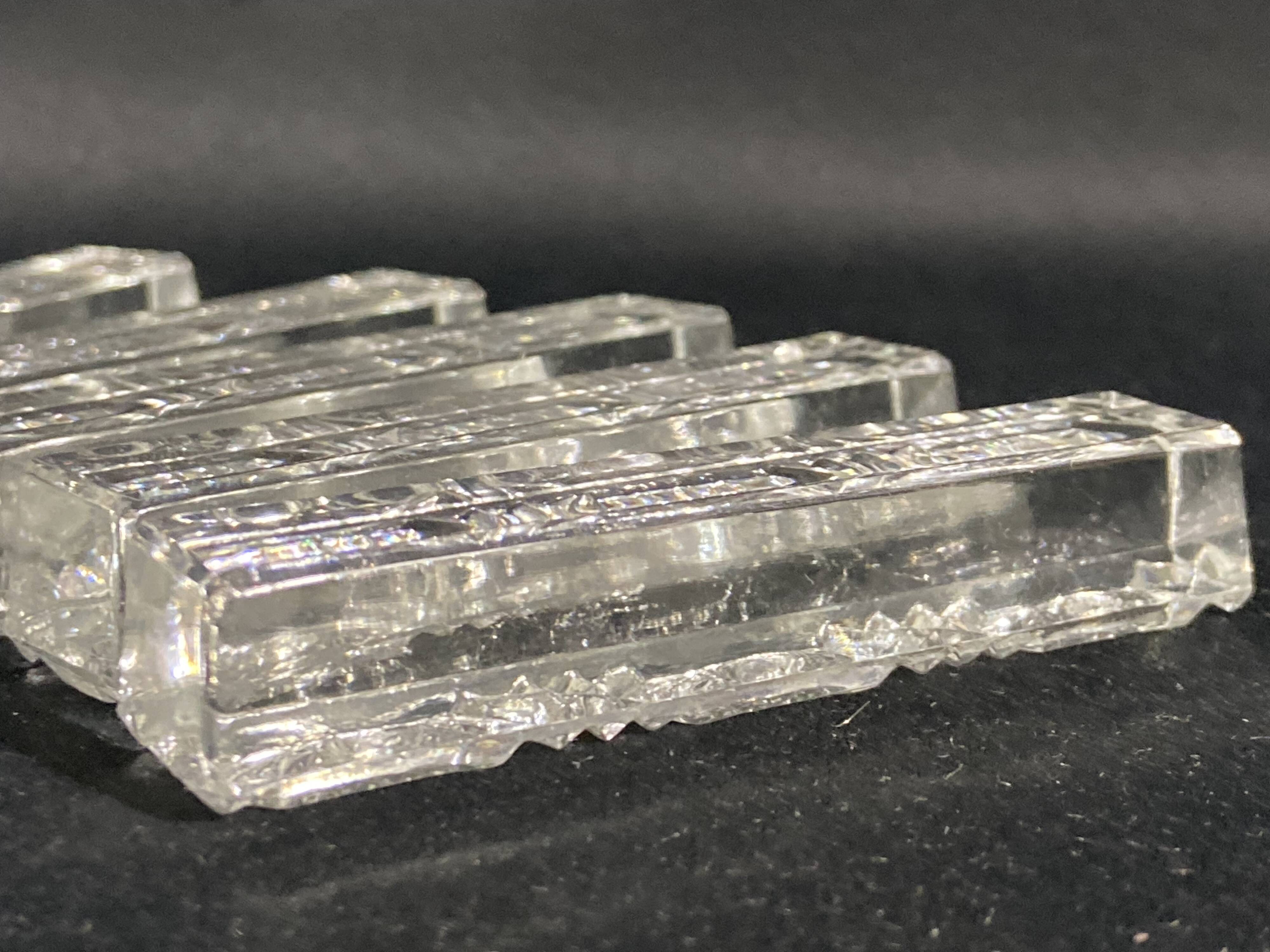 Set of 12 molded glass or crystal knife rests with diamond point decor