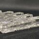 Set of 12 molded glass or crystal knife rests with diamond point decor