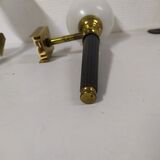 Pair of brass and white opaline wall sconces