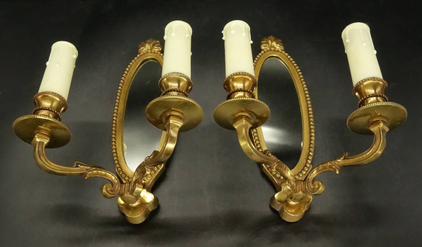 Paire d'appliques-miroirs style Louis XVI - bronze