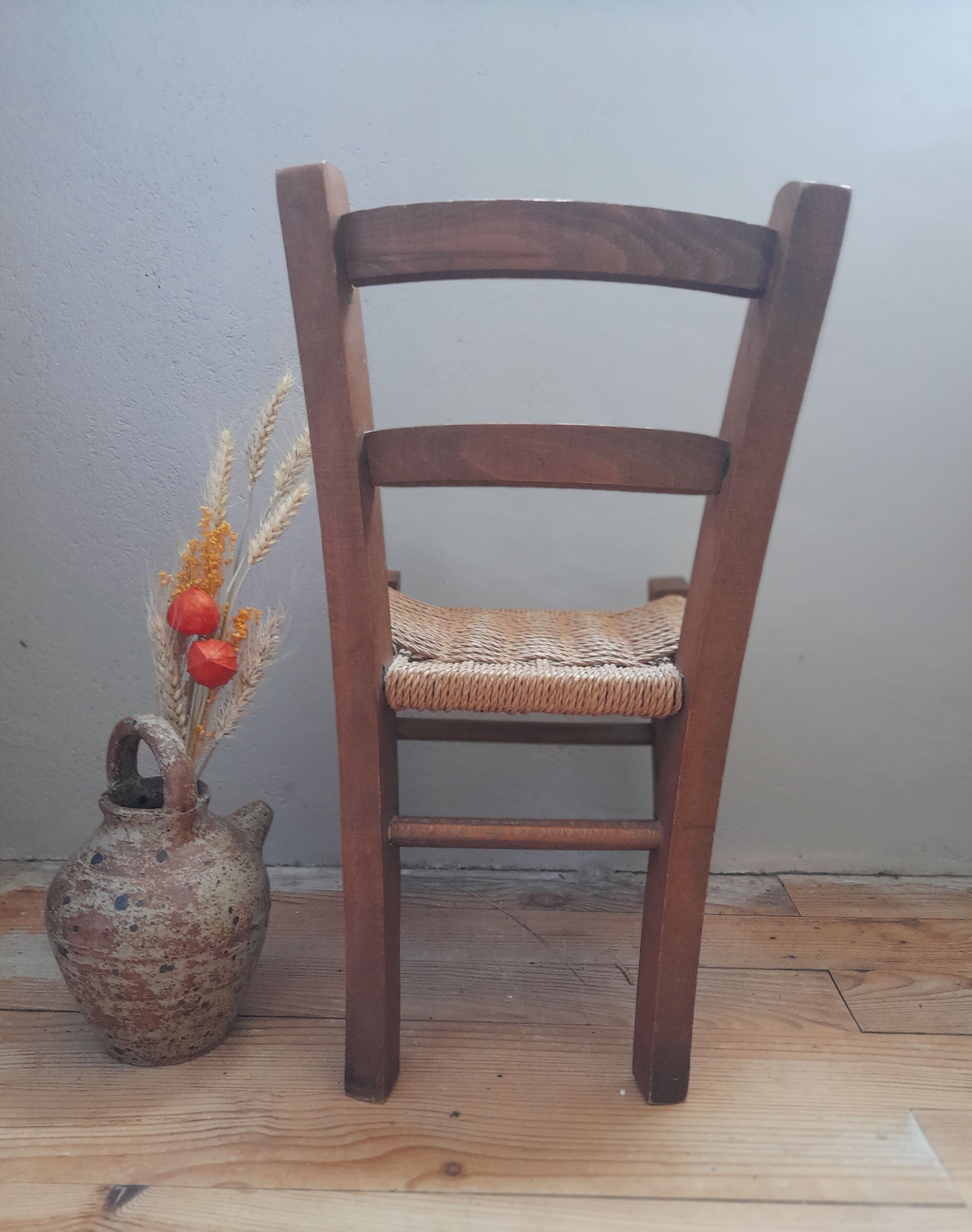 Wooden children's chair, rope seat, circa 1950