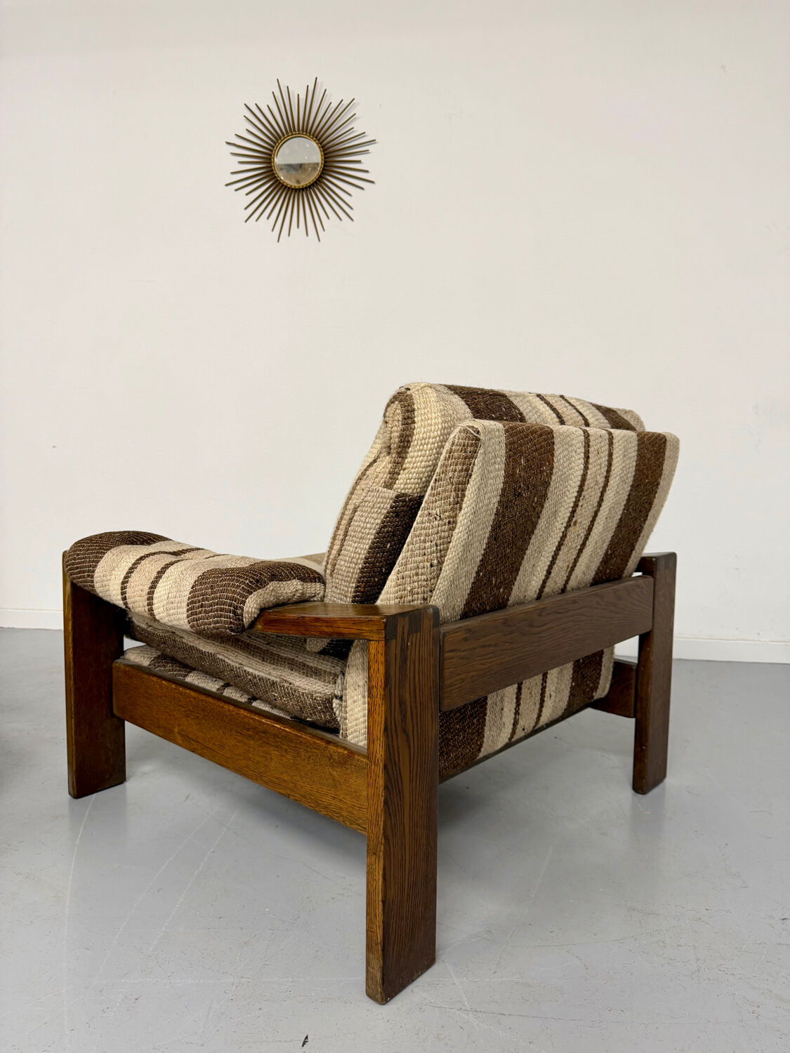 2 vintage 1970s wooden and fabric armchairs