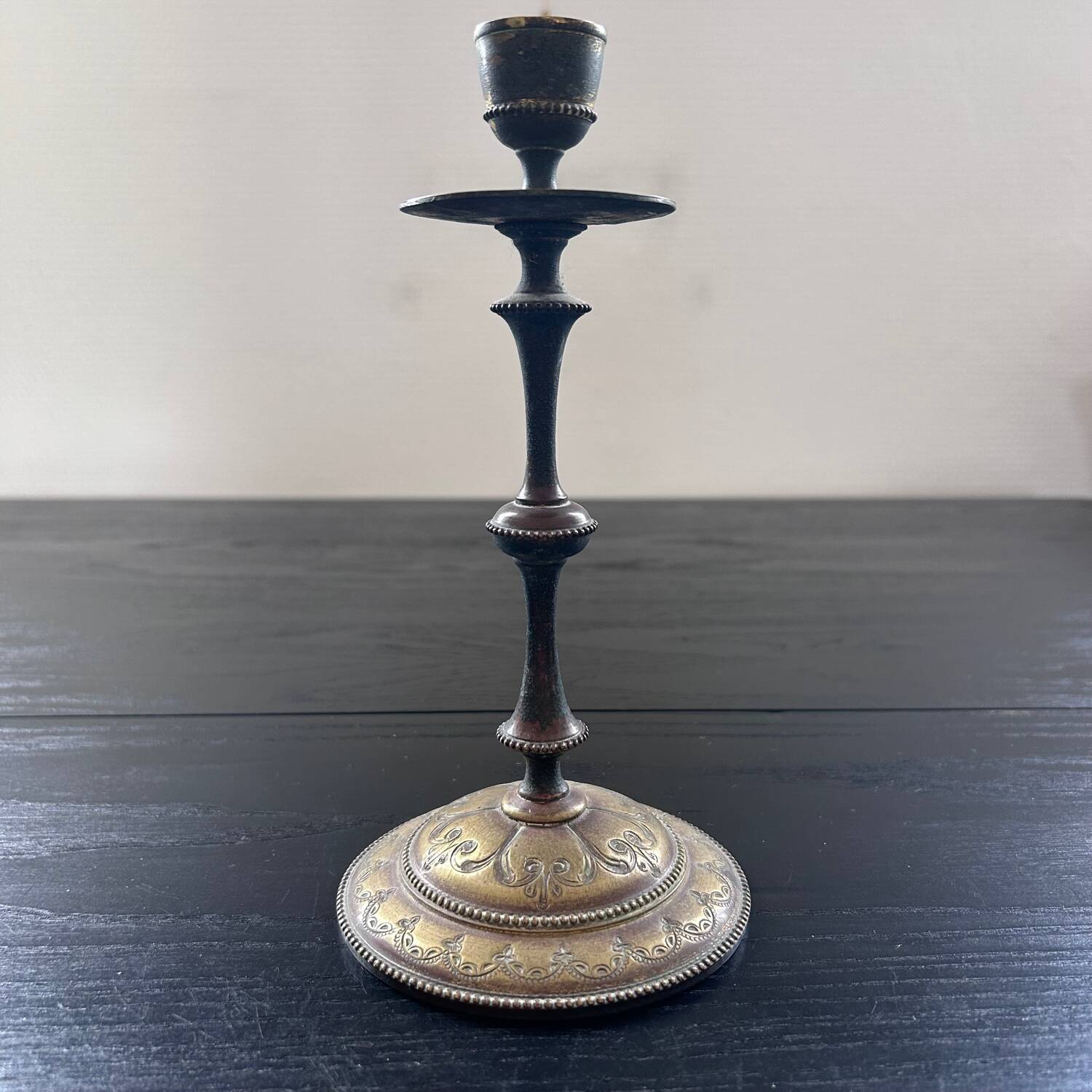 Chiseled brass candlestick