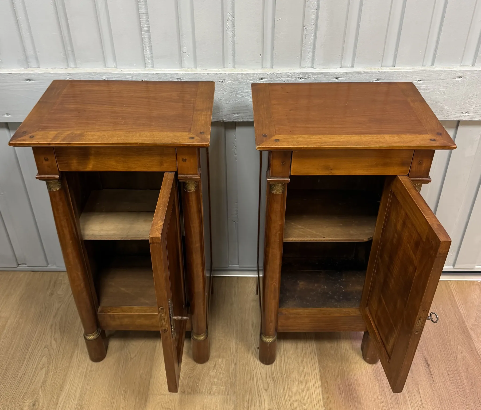 Pair of Empire style bedside tables
