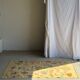 Large beige Indian rug with floral patterns 196x137.
