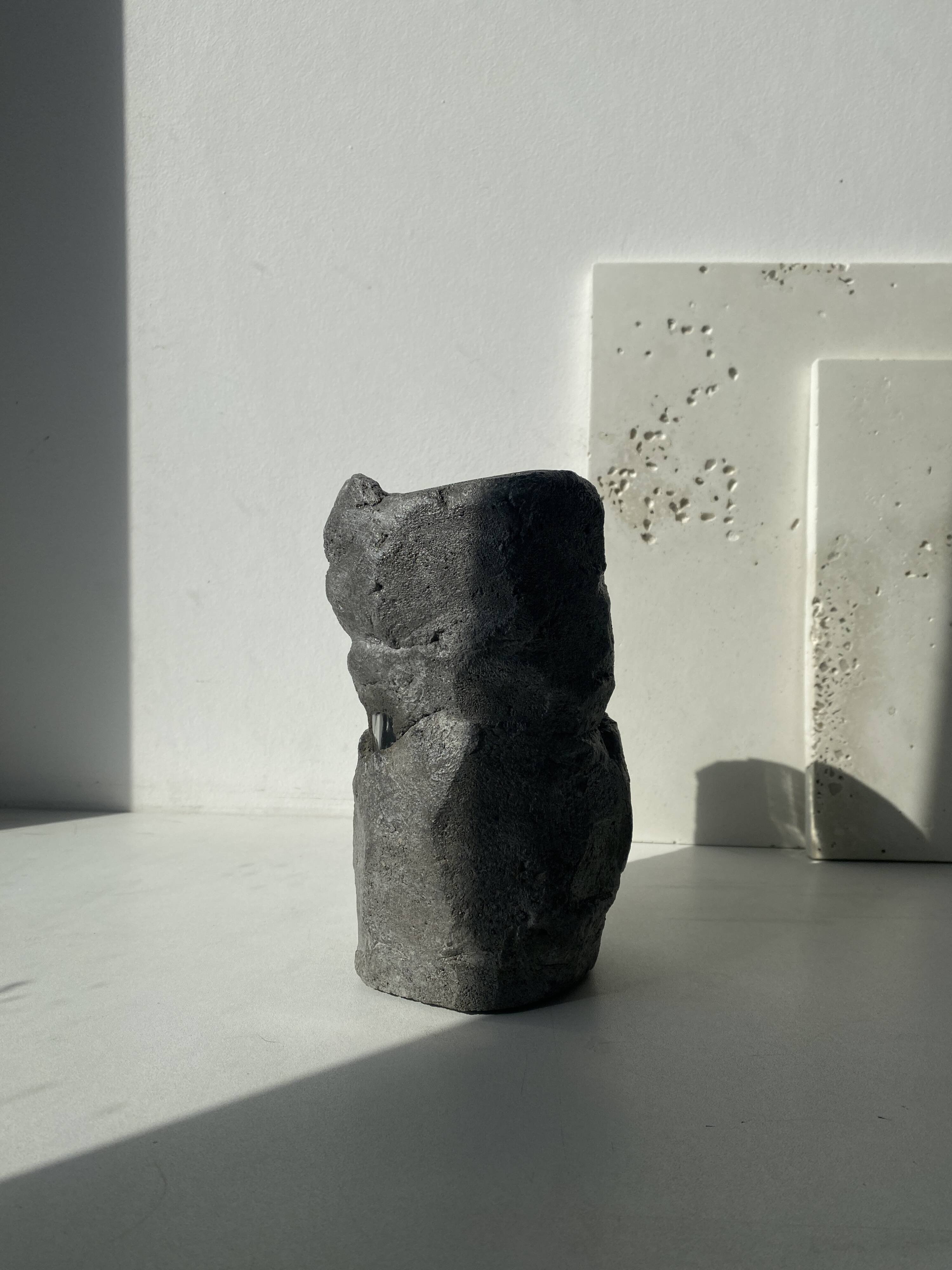 Sculpted concrete vase