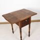 Small shuttered table, or side table.