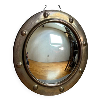 50s French porthole-style witch mirror with convex glass.